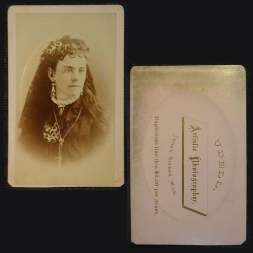 Antique CDV Carte De Visite: Woman from the shoulder area up wearing fancy jewelry and a veil: Front and Back View