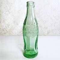 1951 Indiana Evansville vintage empty hobbleskirt PatD Coke bottle with big letters and uneven glass: Front PatD View - Click to enlarge