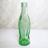 1951 Indiana Evansville vintage empty hobbleskirt PatD Coke bottle with big letters and uneven glass: Back View - Click to enlarge