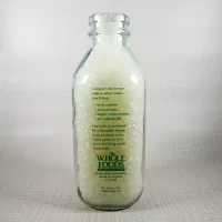 Whole Foods Market Floresville Texas StanPac clear glass square one quart milk bottle with green graphics: Back - Click to enlarge