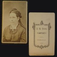 Antique CDV Carte De Visite: Woman from the waist area up with tight ringlet curls and a straight line smile: Front and Back View
