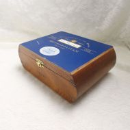 Nat Sherman empty wood cigar box with metal hinges and clasp featuring rounded sides, dovetailing, and beautiful wood grain Main View