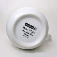 Vintage Sheffield bone white porcelain 8 oz. creamer with beautiful swirl design: Bottom View - Click to enlarge