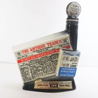 1968 The Antique Trader Jim Beam decanter. Shaped like a folded newpaper. Genuine handcrafted Regal China: Front