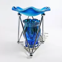 Electric oil warmer with melting blue colors on a triangular metal frame. Frostie blue dish. Nightlight: Left - Click to enlarge