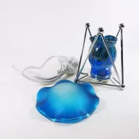 Electric oil warmer with melting blue colors on a triangular metal frame. Frostie blue dish. Nightlight: Parts - Click to enlarge