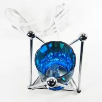 Electric oil warmer with melting blue colors on a triangular metal frame. Frostie blue dish. Nightlight: Top - Click to enlarge