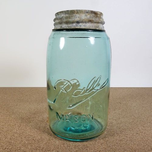 Quart size aqua glass vintage Ball mason jar with Atlas zinc lid and a soft shoulder 3L design: Front View