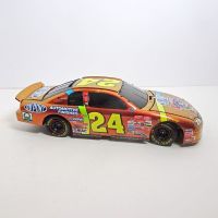 Jeff Gordon gold 1:24 scale No. 24 Action 1998 Chevrolet Monte Carlo Nascar 50th Anniversay diecast car bank with key: Right Side View - Click to enlarge