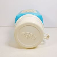 1975 Precious Moments 8 oz. thermos with blue plastic body and cream colored top that doubles as a cup: Top View - Click to enlarge