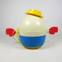 Vintage Fisher Price Humpty Dumpty pull toy with original yellow pull wire. Red hands spin when toy is pulled: Back - Click to enlarge
