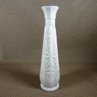 Vintage milk glass bud vase with fluted octagon top and diamond starburst design: Front