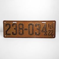 Antique 1922 Illinois metal car license plate. Black graphics on orange background. No. 238-034. Ill 22: Front View - Click to enlarge