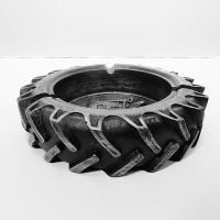 Tobacco Road decorative ashtray catchall bowl showing a tractor in the center and a tractor tire design: Side - Click to enlarge