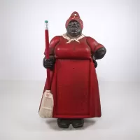 Cast iron vintage Mammy in red dress notepad holder wall hanging with pencil as broom handle: Front
