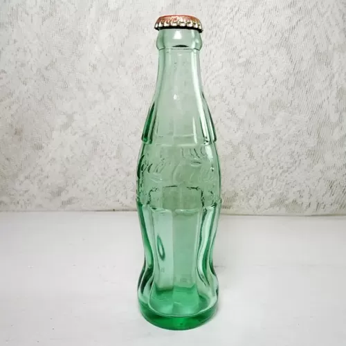 San Francisco California 6 oz empty hobbleskirt Coke bottle with Coca Cola Classic cap: pat'd Side