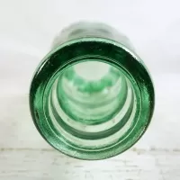Tampa Florida vintage 6 oz. empty hobbleskirt no refill pat'd Christmas Coke bottle in aqua tinted glass: Top Rim - Click to enlarge