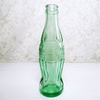 Peoria Illinois 6 oz empty hobbleskirt no refill collectible vintage Christmas Coke bottle. Aqua tinted glass: Left Side View - Click to enlarge