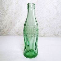 1951 Indiana Evansville vintage empty hobbleskirt PatD Coke bottle with big letters and uneven glass: Right Side View - Click to enlarge