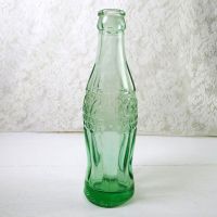 1947 Elizabethtown Kentucky vintage empty hobbleskirt PatD Coke bottle with big letters and uneven glass: Left Side View - Click to enlarge