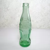 Minneapolis Minnesota 6 oz empty hobbleskirt no refill collectible vintage Christmas Coke bottle. Aqua tinted glass: Back - Click to enlarge