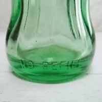 Minneapolis Minnesota 6 oz empty hobbleskirt no refill collectible vintage Christmas Coke bottle. Aqua tinted glass: No Refill - Click to enlarge