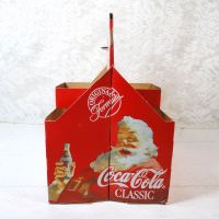 Six 1993 full Seasons Greetings Coca Cola Classic 8 oz soft drink bottles in the original cardboard carton: Carton Santa Side View - Click to enlarge