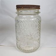 Jumbo Peanut Butter vintage clear glass jar with embossed elephant head: Front