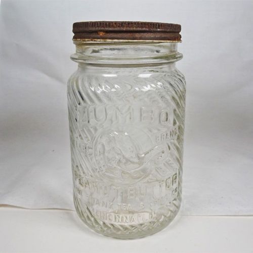 Jumbo Peanut Butter vintage clear glass jar with embossed elephant head: Front