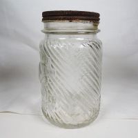 Jumbo Peanut Butter vintage clear glass jar with embossed elephant head: Left - Click to enlarge