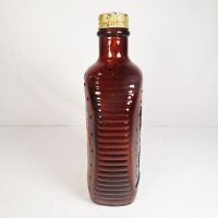 1976 Eagle Log Cabin bicentennial brown glass pancake syrup bottle. Paper label, ribbed sides, metal cap: Left Side View - Click to enlarge