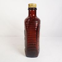 1976 Eagle Log Cabin bicentennial brown glass pancake syrup bottle. Paper label, ribbed sides, metal cap: Right Side View - Click to enlarge