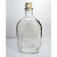 Vintage 1976 Log Cabin with Flag, plow and barrel clear glass 24 oz empty bicentennial pancake syrup bottle: Back View