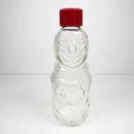 Vintage Bo-Bo the Clown 4 oz. figural glass medicine bottle. Red screw top doubles as the clown's hat: Front