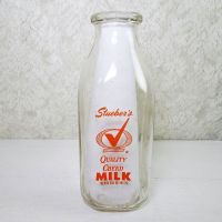 Vintage 1961 Stueber's Wausau Wis. quart pyro ACL glass milk bottle with a large Q with a checkmark thru it Quality Chekd : Front View