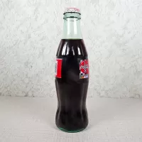 Nascar Cap 1999 The Coca Cola Racing Family. Full 8 oz. Coke Classic Soda Bottle: Side - Click to enlarge