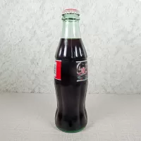 Dale Earnhardt Jr and Sr Nascar unopened 8 oz Coca Cola Classic bottle. Simulated signature. Checkered flag: Side - Click to enlarge