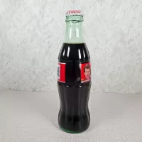 Bill Elliott Nascar No. 94 Coca Cola Racing Family 1999 full 8 oz Coke Classic Bottle: Side - Click to enlarge