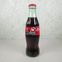 Kyle Petty Nascar No. 44 Coca Cola Racing Family 1999 full 8 oz Coke Classic Bottle: Front - Click to enlarge