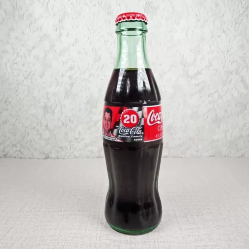 Tony Stewart Nascar No. 20 Coca Cola Racing Family 1999 full 8 oz Coke Classic Bottle: Front