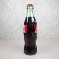 Tony Stewart Nascar No. 20 Coca Cola Racing Family 1999 full 8 oz Coke Classic Bottle: Side - Click to enlarge