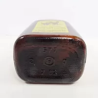 Dr. Scat 1961 vintage 7 fl. oz. Brockway typewriter refinisher amber bottle with dauber top: Bottom - Click to enlarge