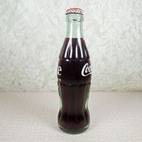 No Location vintage 6-1/2 oz full Coke bottle with white painted graphics and red Coca Cola Classic cap: Right - Click to enlarge