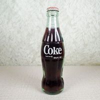 No Location vintage 6-1/2 oz full Coke bottle with white painted graphics and red Coca Cola Classic cap: Back - Click to enlarge