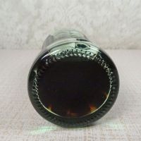 No Location vintage 6-1/2 oz full Coke bottle with white painted graphics and red Coca Cola Classic cap: Bottom - Click to enlarge