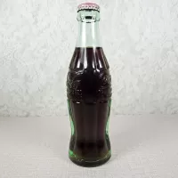 Tempe Arizona vintage 6 oz full hobbleskirt Coke bottle with Red Coca Cola Classic cap: Left - Click to enlarge