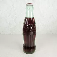 Denver Colorado vintage 8 oz full hobbleskirt no refill Coke bottle with Coca Cola Classic cap: Front