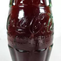 Denver Colorado vintage 8 oz full hobbleskirt no refill Coke bottle with Coca Cola Classic cap: patD - Click to enlarge