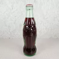 Jacksonville Florida vintage 8 oz full hobbleskirt no refill Coke bottle with Coca Cola Classic cap: Front - Click to enlarge