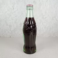 Atlanta Georgia vintage 6 oz full hobbleskirt Coke bottle with red Coca Cola Classic cap: Front - Click to enlarge